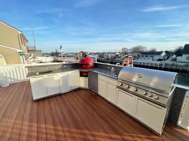 XL kamado Joe with stone countertop outdoor cabinets web