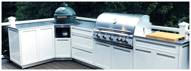 Green egg and Blaze grill in 4 Life outdoor kitchen white